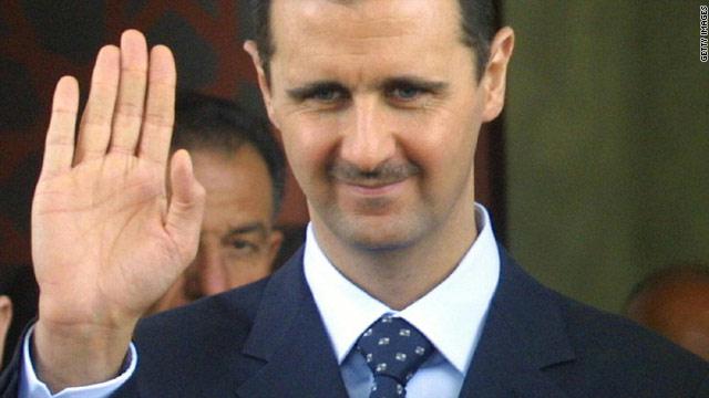 معارضون: هولاند فضح تواطؤ الأسد مع المتشددين