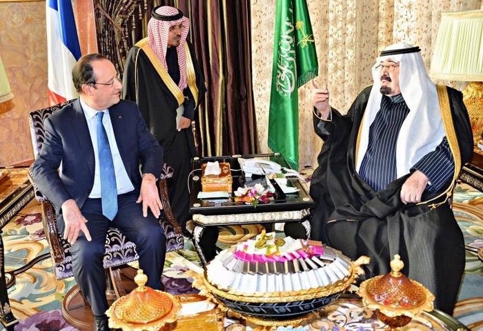 الملك عبدالله لـ “هولاند” : الأسد “دمر بلاده”