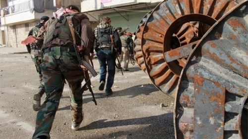 الائتلاف السوري يطالب بمده بالأسلحة والمقاتلين في القصير