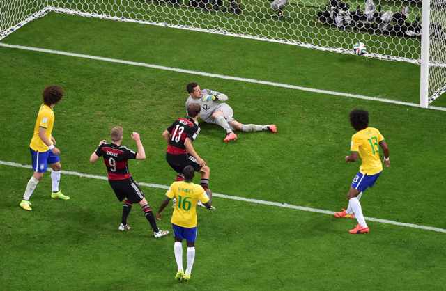 Germany's Andre Schuerrle (9) scores their sixth goal during their 2014 World Cup semi-finals against Brazil at the Mineirao stadium in Belo Horizonte July 8, 2014. REUTERS/Francois Xavier Marit/Pool (BRAZIL - Tags: SOCCER SPORT WORLD CUP)