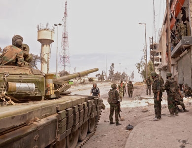 أنباء عن إعادة انتشار قوات الأسد حول العاصمة دمشق