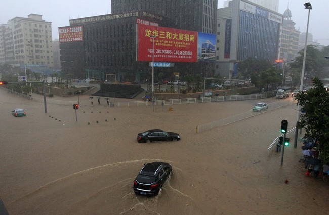 بالصور.. فيضانات الصين  تقتل 3 وتجلي 54 ألفا