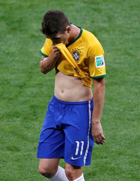 Brazil's Oscar reacts during their 2014 World Cup semi-finals against Germany at the Mineirao stadium in Belo Horizonte July 8, 2014. REUTERS/David Gray (BRAZIL - Tags: SOCCER SPORT WORLD CUP)