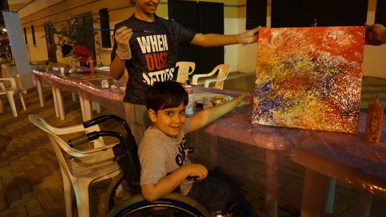 أطفال عسير المعوقون يشاركون في ورشة رسم بالمفتاحة