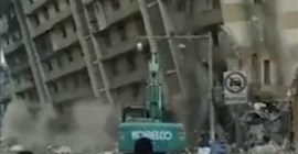 شاهد.. مبنى من 8 طوابق يسقط في اتجاه خاطئ بالصين