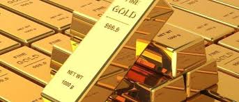 الذهب ينخفض مجدداً بضغط من الدولار