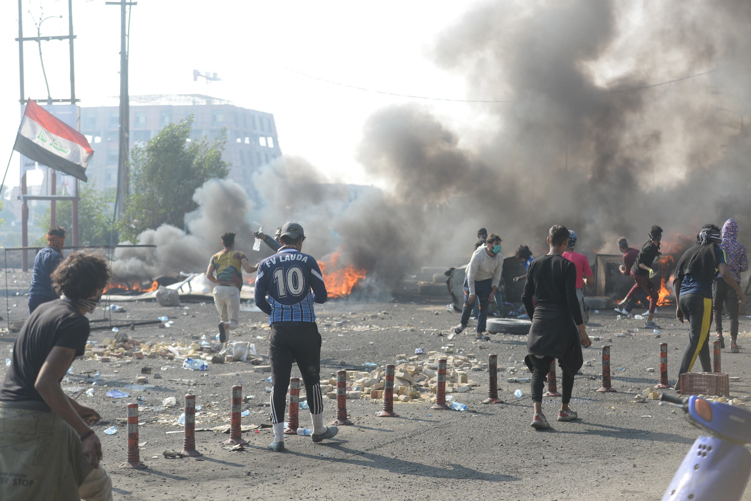 اشتباكات عنيفة بين قوات الأمن والمحتجين بالعراق
