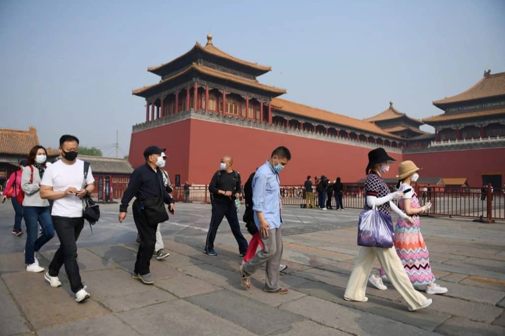 الصين تتعهد بالعمل مع الصحة العالمية لمعرفة أصل كورونا