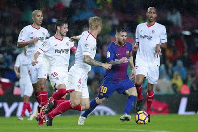 الفوز هدف برشلونة ضد إشبيلية للصدارة