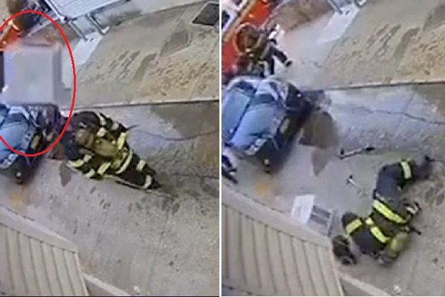 شاهد.. سقوط مكيف من أعلى مبنى على رأس رجل إطفاء