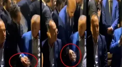 أردوغان يرفض شرب الماء من يد حارسه الشخصي