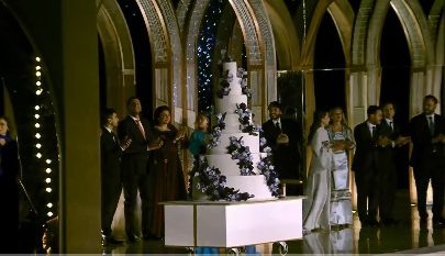 لحظة تقطيع الكعكة في حفل زفاف ولي عهد الأردن والأميرة رجوة