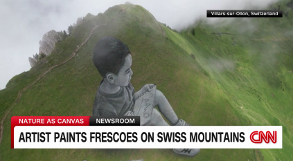 فنان يرسم على جبال سويسرا لوحات فنية لا تُصدق