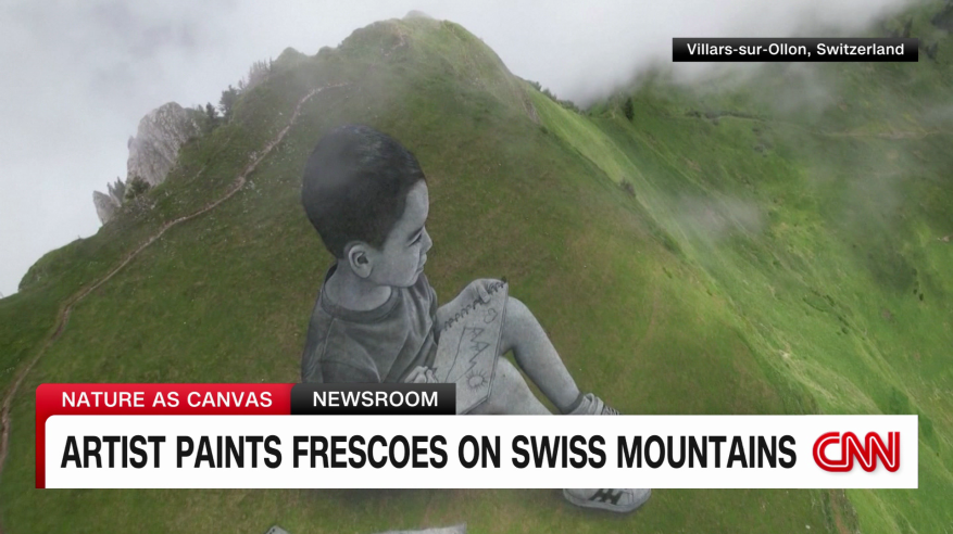 فنان يرسم على جبال سويسرا لوحات فنية لا تُصدق