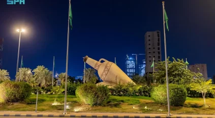 اليوم الوطني.. شوارع وميادين العاصمة المقدسة تتزين بالأعلام