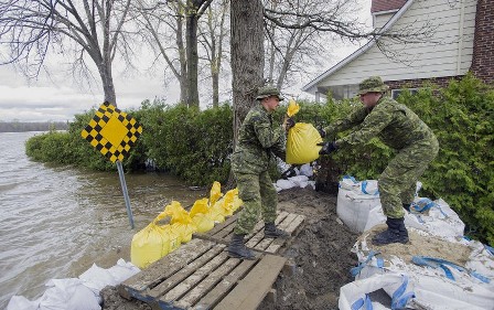بالصور.. فيضانات غير مسبوقة في كندا جراء الأمطار الغزيرة