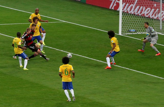 Germany's Andre Schuerrle scores his team's sixth goal against Brazil during their 2014 World Cup semi-finals at the Mineirao stadium in Belo Horizonte July 8, 2014. REUTERS/David Gray (BRAZIL - Tags: SOCCER SPORT WORLD CUP)