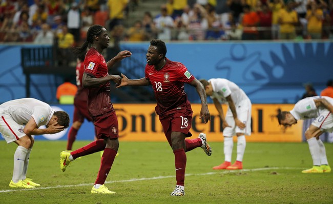 Portugal's Varela celebrates with his teammate Eder after scoring a goal against the U.S. during their 2014 World Cup Group G soccer match at the Amazonia arena in Manaus