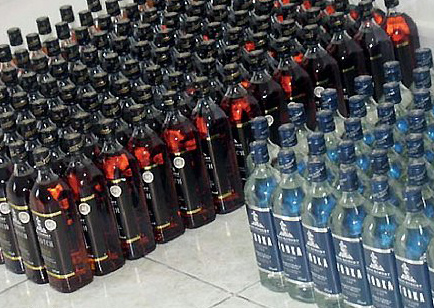 ضبط (9257) زجاجة مسكر في مصنع للخمور بالخرج