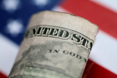 انخفاض الدولار أمام سلة من العملات