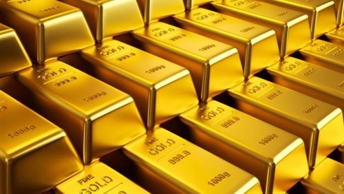 الذهب يتراجع متأثراً بزيادة الضغوط على الدولار