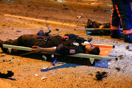 ATTENTION EDITORS - VISUAL COVERAGE OF SCENES OF INJURY OR DEATH An injured policeman lies on a stretcher at the site of an explosion in central Istanbul, Turkey, December 10, 2016. REUTERS/Murad Sezer