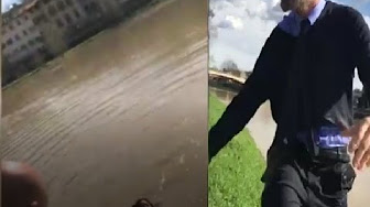 شاهد.. شرطي يلقي نفسه في النهر لإنقاذ فتاة