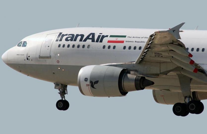 حريق ضخم في طائرة إيرانية على متنها 100 راكب