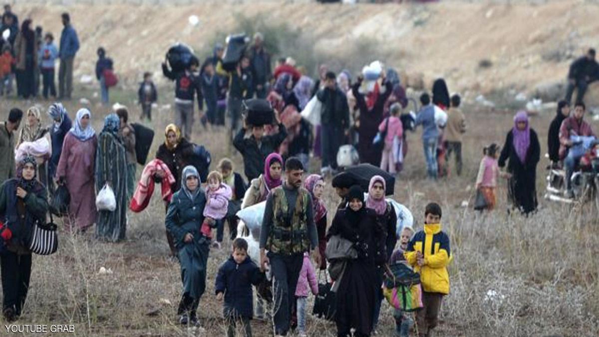 معارك حماة تجبر عشرات آلاف السوريين على النزوح
